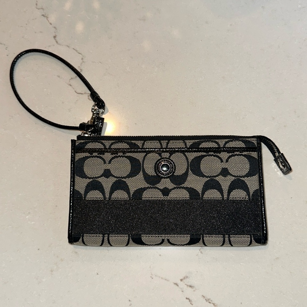 Gray and black coach zip up wristlet